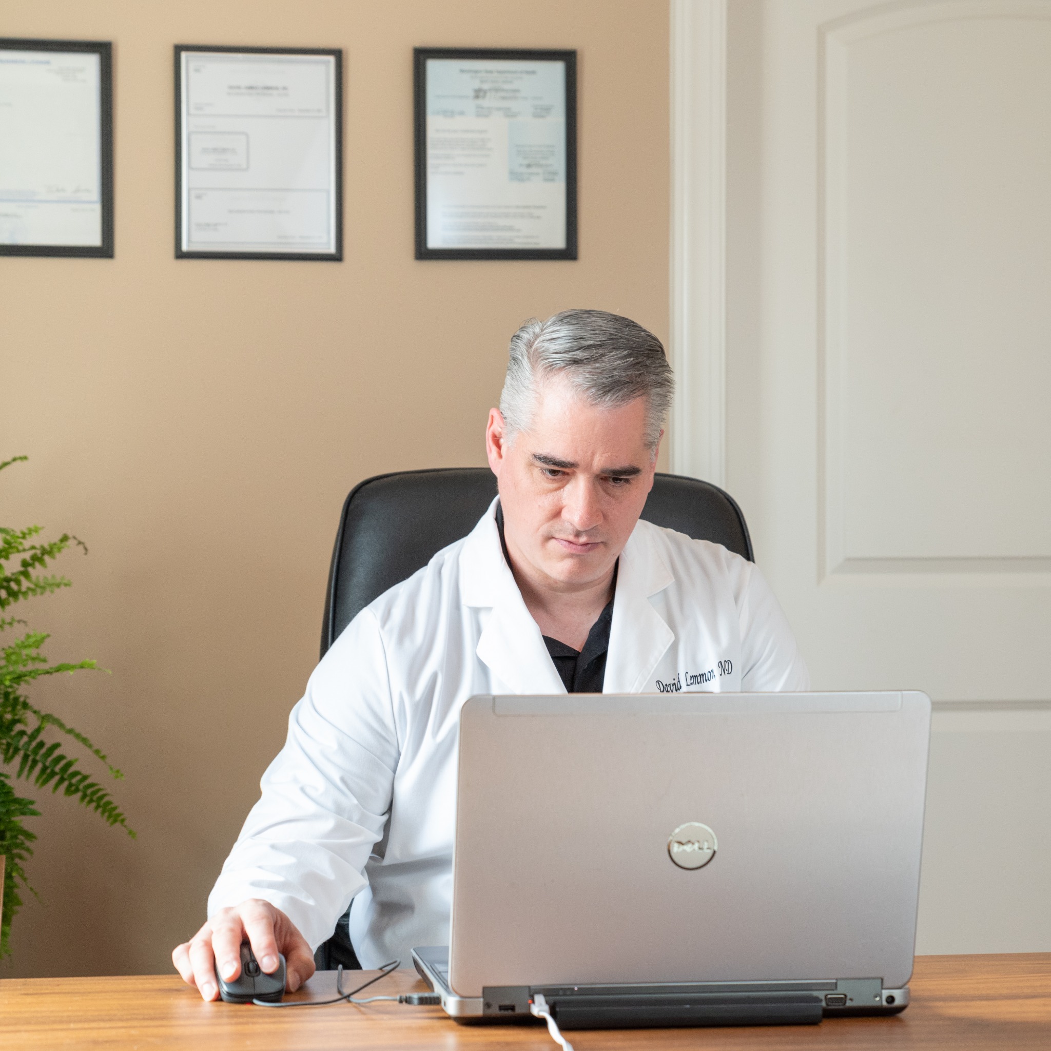Dr. David Lemmon at his office desk